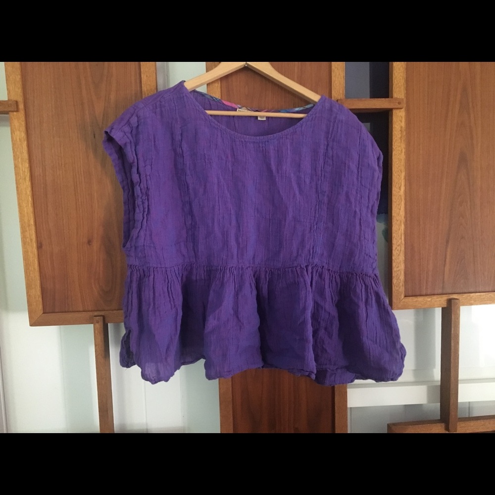 Anthropologie holding horses boxy peplum top.